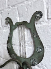 Load image into Gallery viewer, A pair of French metal lyre shaped candle wall sconces with glass flower decoration