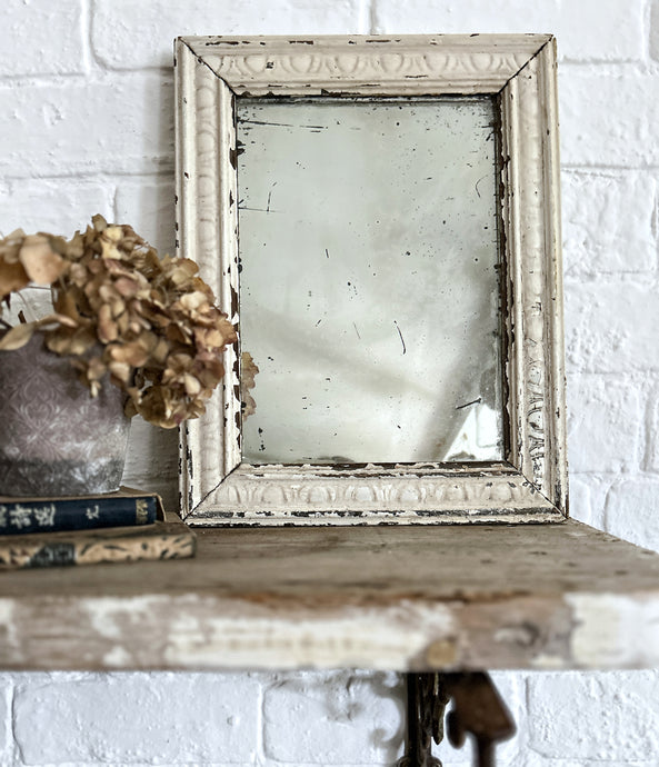 French antique white painted egg and dart framed mirror