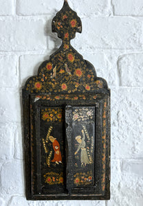An antique early 20th Century Qajar Persian painted wooden mirror with two doors