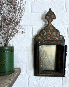 An antique early 20th Century Qajar Persian painted wooden mirror with two doors
