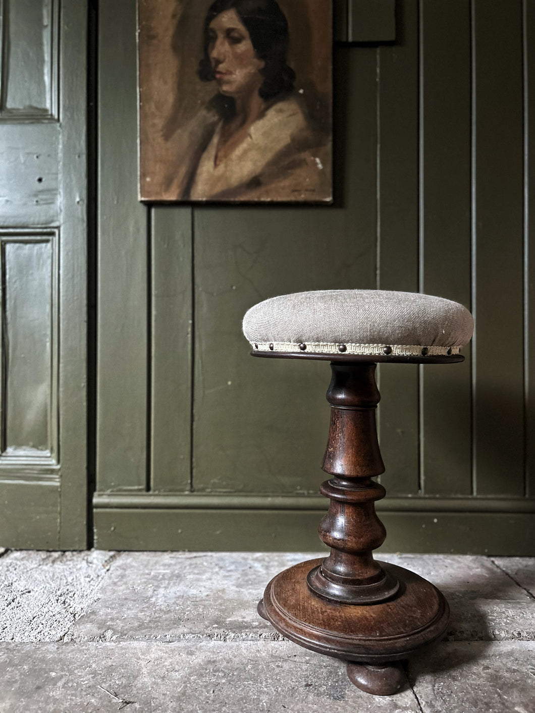 Antique Victorian mahohany reupholstered linen piano stool