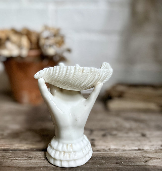 Antique Victorian white glazed Parian porcelain pottery childs hand clasping a sea shell