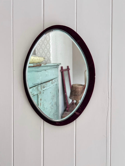 Antique Victorian red velvet framed oval wall mirror