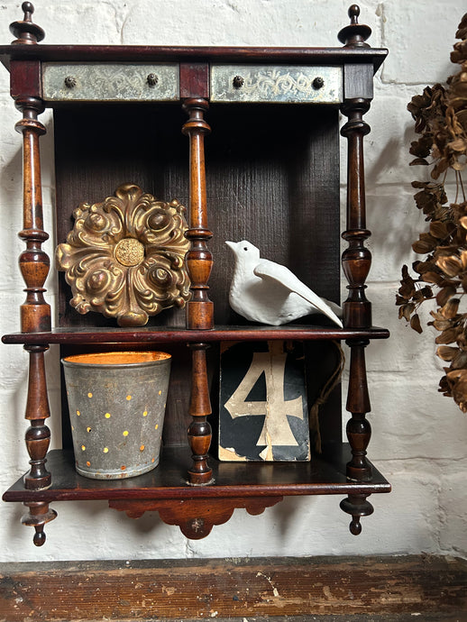 Antique dark wooden wall hanging shelving unit with mercury glass decorative detail