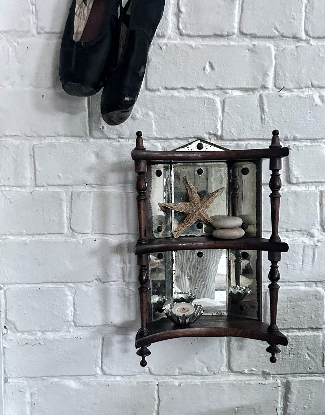 Antique mercury glass back wooden display wall unit