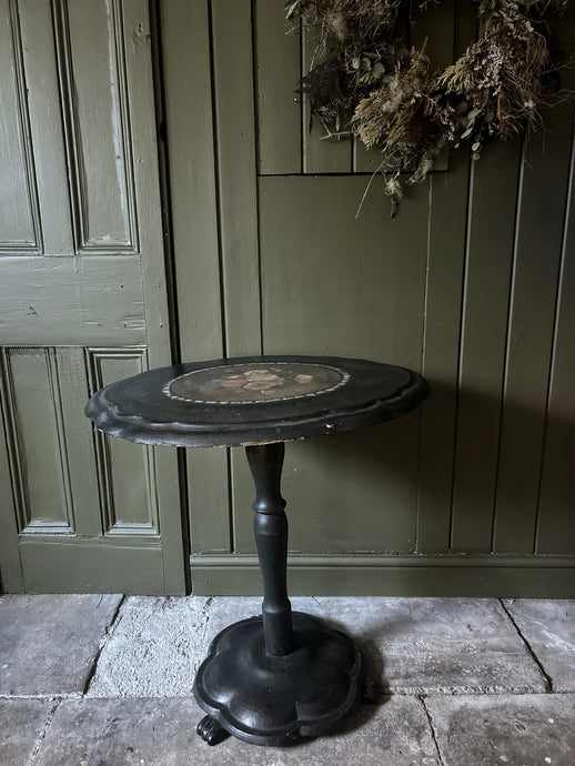 Black Victorian tilt top papier mache table with floral top and mother of pearl inlay