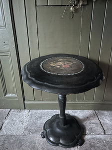 Black Victorian tilt top papier mache table with floral top and mother of pearl inlay