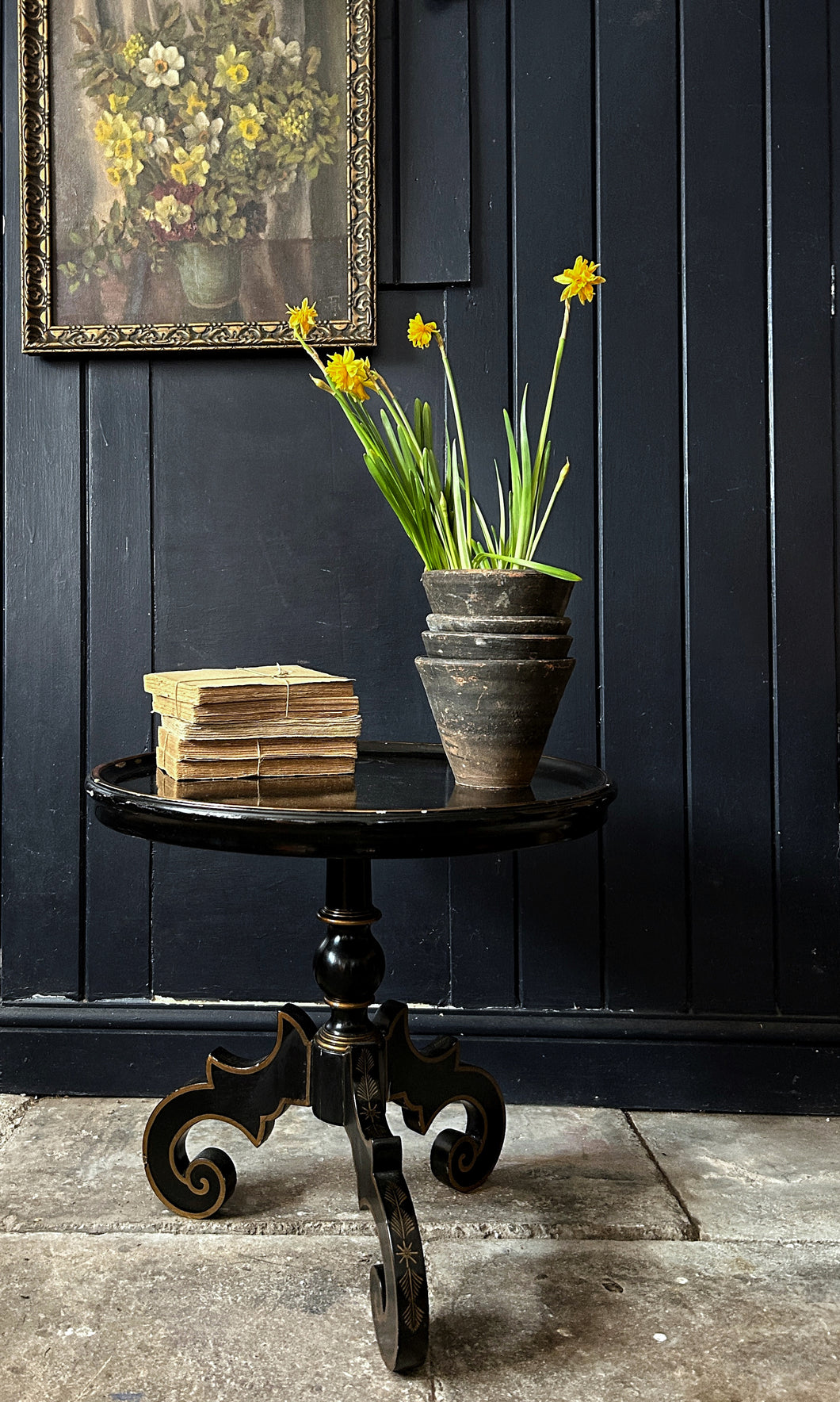 Decorative gold painted black lacquered side table