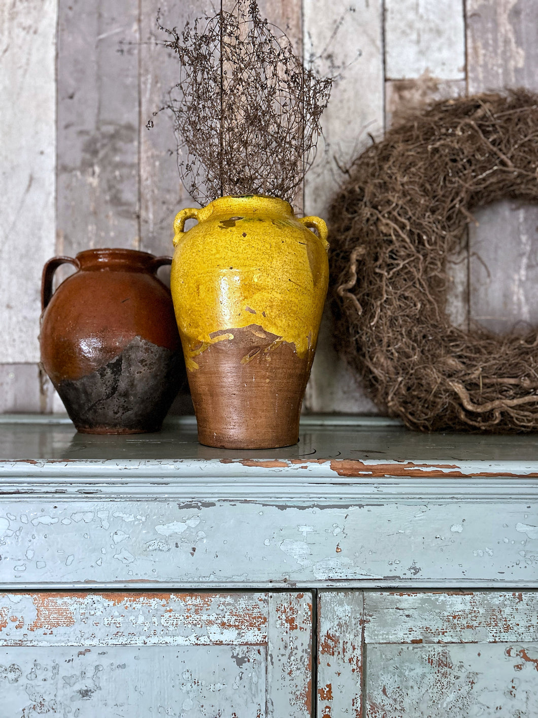 Early 20th Century part glazed terracotta olive oil pot