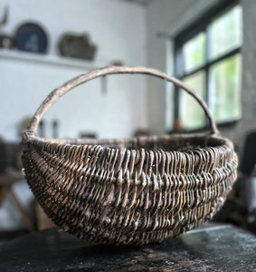Antique French woven willow market foraging basket with steamed wooden handle
