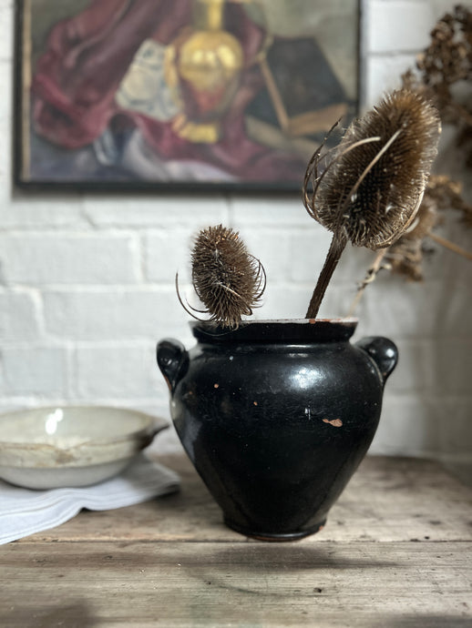 A French black glazed antique confit pot
