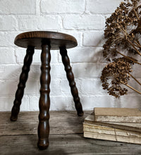 Load image into Gallery viewer, French antique dark wooden three legged bobbin stool