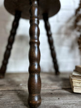 Load image into Gallery viewer, French antique dark wooden three legged bobbin stool