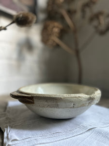 A French antique white glazed shallow pouring bowl