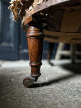 Load image into Gallery viewer, An antique Napoleon III French deconstructed button back tub chair with turned legs