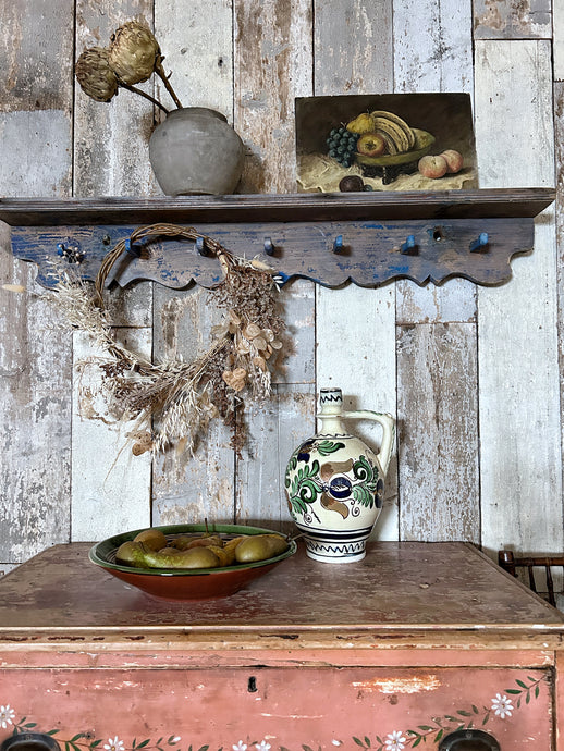 A Blue Painted Hungarian primitive wooden peg coat rack with shelf