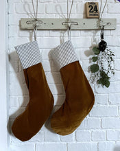 Load image into Gallery viewer, velvet ochre, hazel, brown,umber, christmas stocking with a contrasting black &amp; white ticking striped top