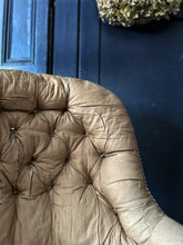 Load image into Gallery viewer, An antique distressed de-constructed button back slipper chair with turned legs &amp; castors
