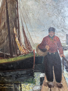 An antique Dutch sailor on jetty with boat oil painting in original gilt frame, signed.