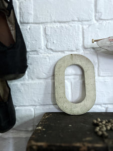 A vintage original painted wooden letter O