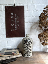 Load image into Gallery viewer, Vintage Japanese glazed pottery Saki bottle with calligraphy detail