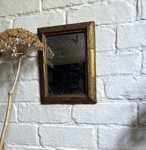 A Small antique gold gilt decorative wall mirror