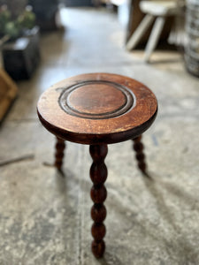 A small French vintage round 3 legged bobbin stool