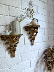 A Vintage pair of gilded Florentine rococo style wall brackets