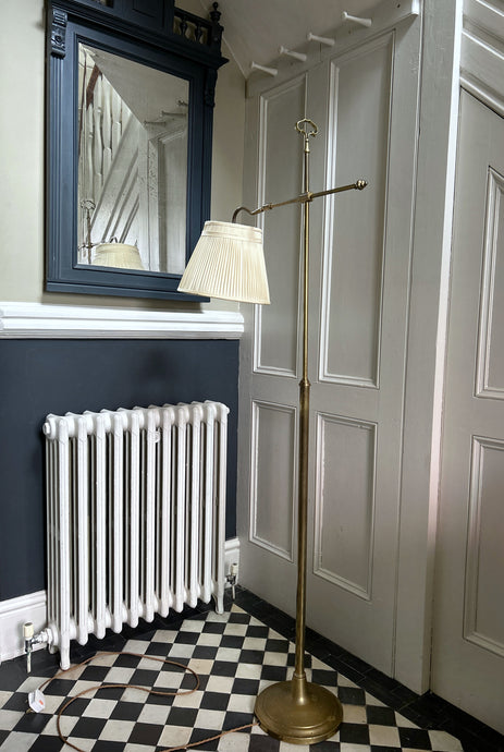 An Antique brass Late 19th Century adjustable swing reading library floor lamp