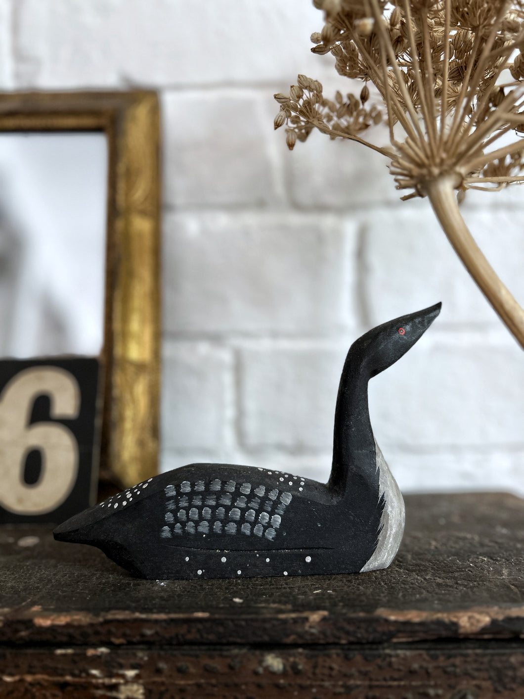A HAND CRAFTED VINTAGE HAND PAINTED WOODEN DUCK
