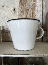 Load image into Gallery viewer, A large vintage enamel measuring jug with measurements inside