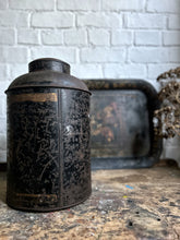 Load image into Gallery viewer, Large antique 1800's trading company toleware tea storage tin with gold detail on front