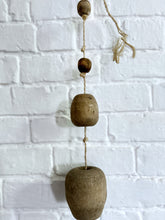 Load image into Gallery viewer, A string of reclaimed French vintage hanging wooden balls on rope