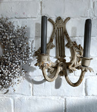 Load image into Gallery viewer, A vintage painted metal cast iron 2 arm harp lyre candle wall sconce.