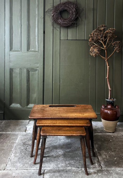 Mid 20th century modernist vintage nest of tables with integral magazine rack