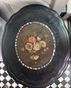Black Victorian tilt top papier mache table with floral top and mother of pearl inlay