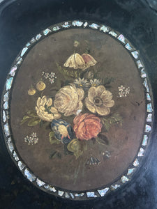 Black Victorian tilt top papier mache table with floral top and mother of pearl inlay