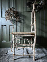 Load image into Gallery viewer, Primitive coppiced wood twig chair with carved mouse on back