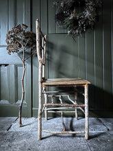 Load image into Gallery viewer, Primitive coppiced wood twig chair with carved mouse on back