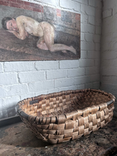 Load image into Gallery viewer, A Vintage coppiced wooden woven oak swill basket with darker bent wood rim.