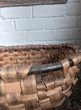 Load image into Gallery viewer, A Vintage coppiced wooden woven oak swill basket with darker bent wood rim.