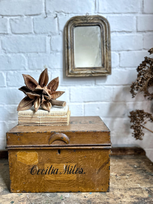 Scumbled painted antique deed box name in fine writing on the front