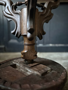 A Victorian Late 19th century Antique walnut carved, adjustable piano stool with distressed leather seat