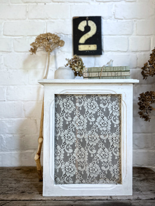 A Vintage French white chippy painted wooden bathroom wall hung cabinet