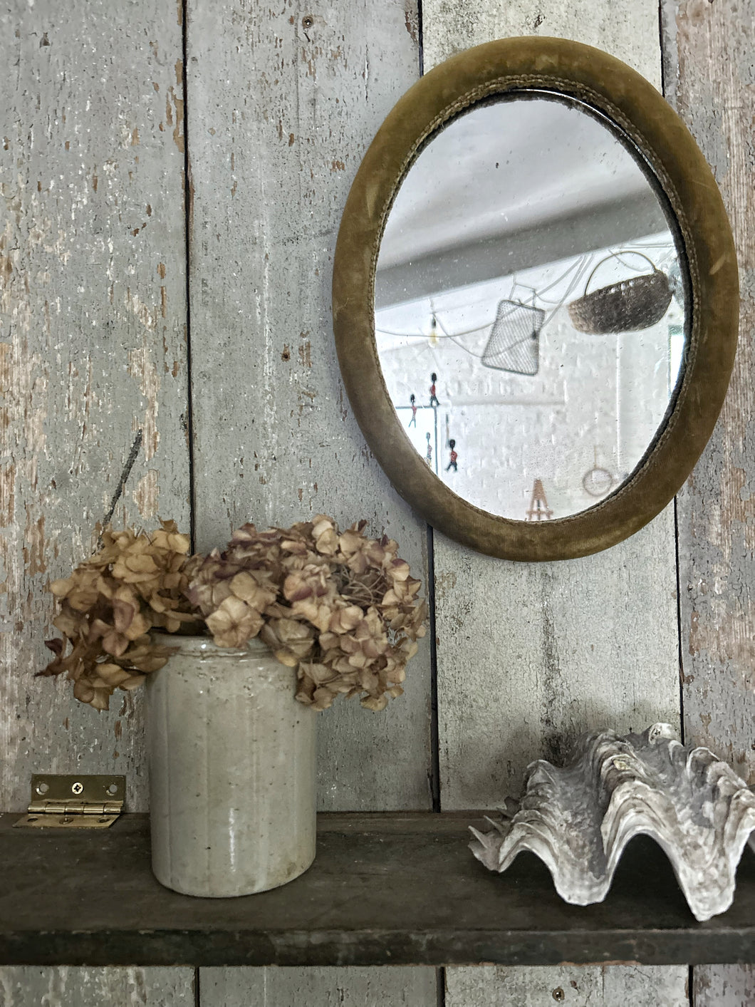 Vintage Mid century gold ochre velvet oval mirror