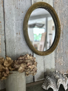 Vintage Mid century gold ochre velvet oval mirror