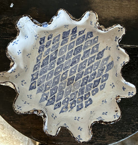 Vintage blue & white pottery repousse style dish on pedestal with bees around base