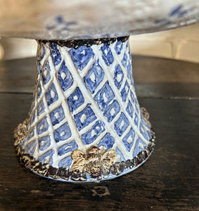 Vintage blue & white pottery repousse style dish on pedestal with bees around base