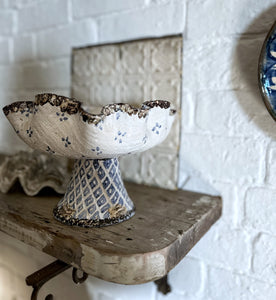 Vintage blue & white pottery repousse style dish on pedestal with bees around base