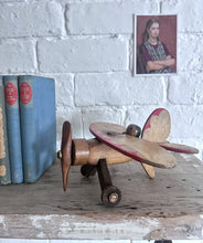 Load image into Gallery viewer, Vintage wooden toy propeller plane with pilot